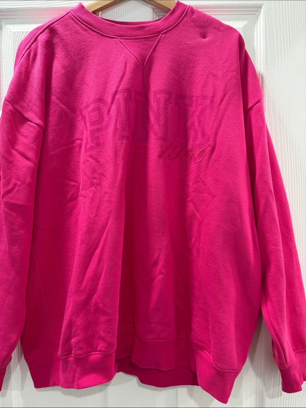 PINK Victoria's Secret Embossed Logo Crewneck Sweatshirt in Hot Pink